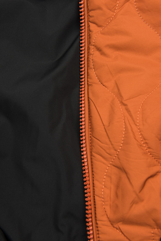 Prešita jesenska/pomladna parka oranžna in črna