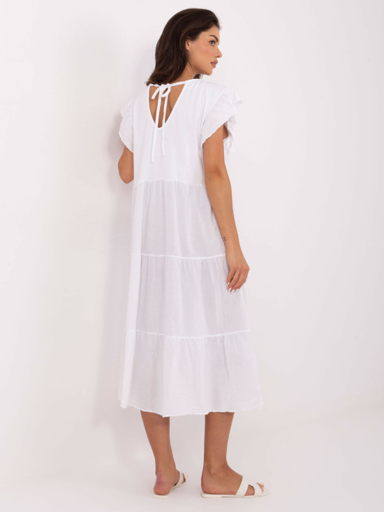 Bela oversize obleka z volanom