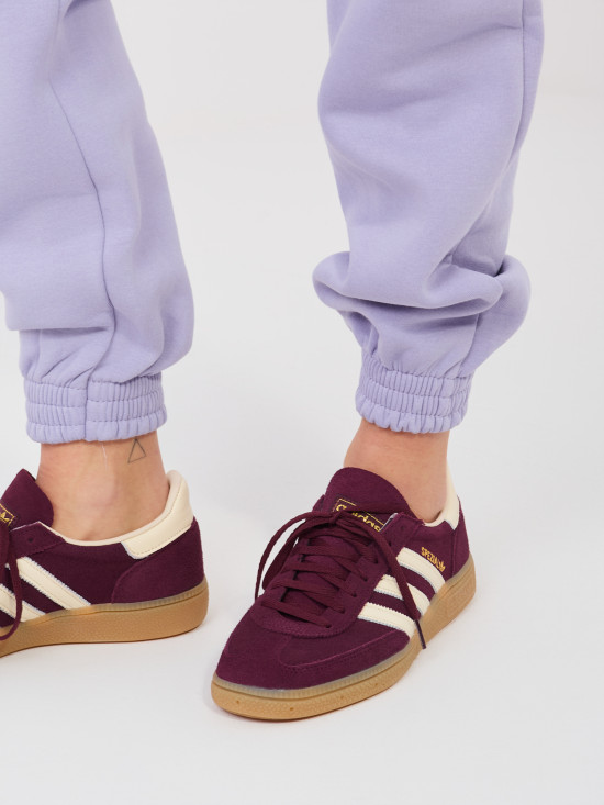 Ženske športne hlače v svetlo vijolični barvi z visokim pasom