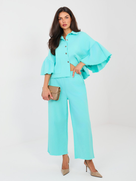 Kratka jeans jakna z volanom v turkizni barvi