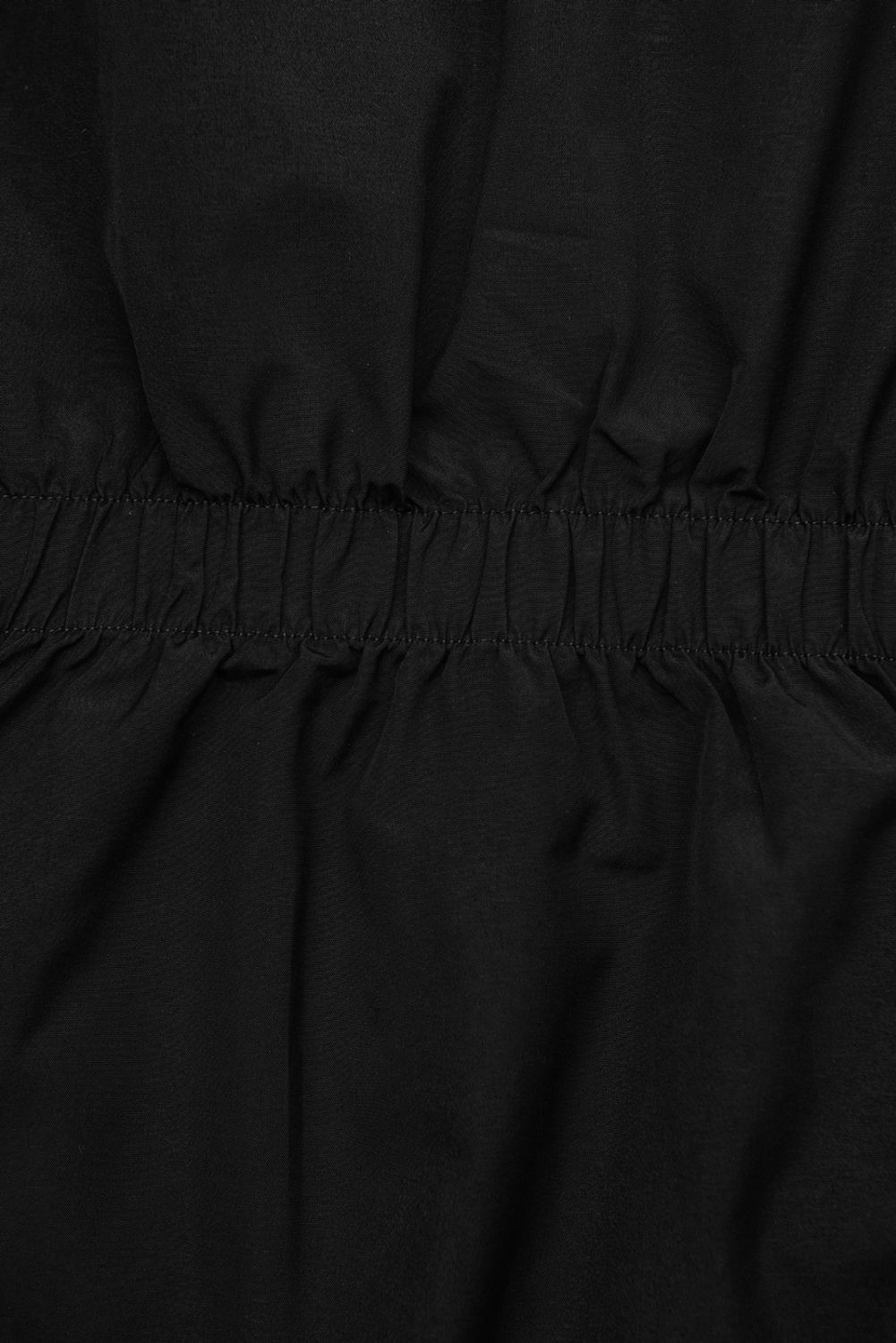 Črna obojestranska jakna s pepita vzorcem