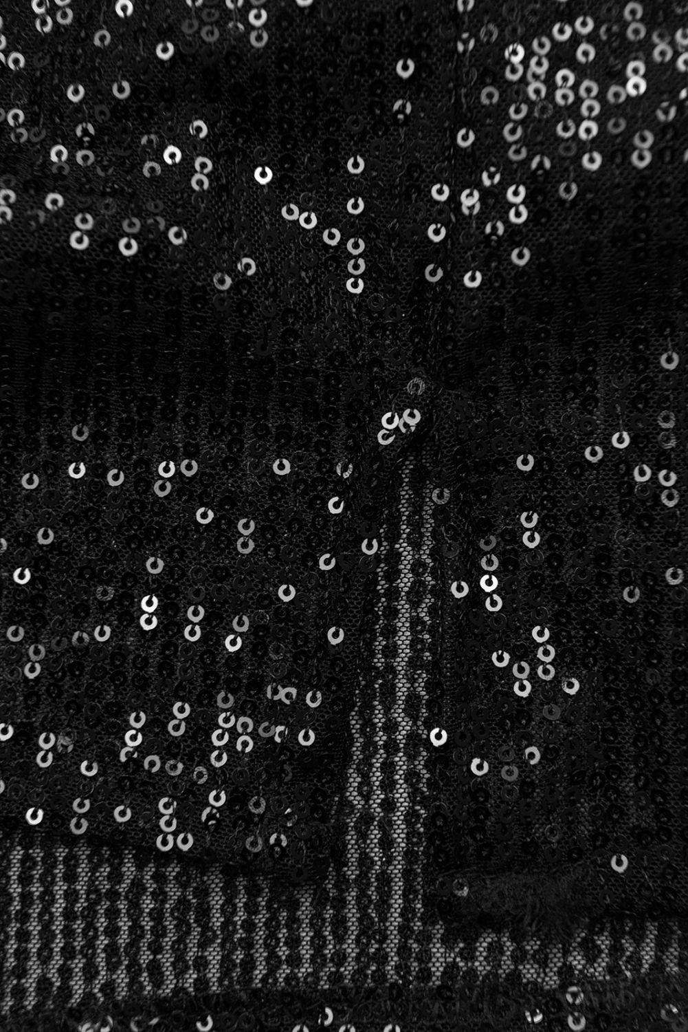 Črna obleka z bleščicami