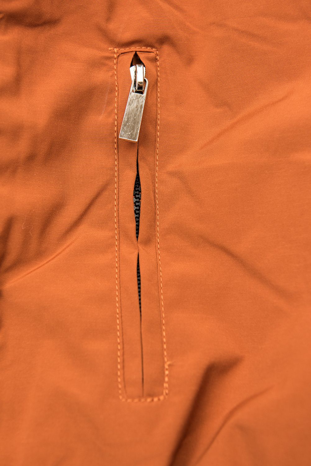 Oranžna zimska parka s toplo podlogo