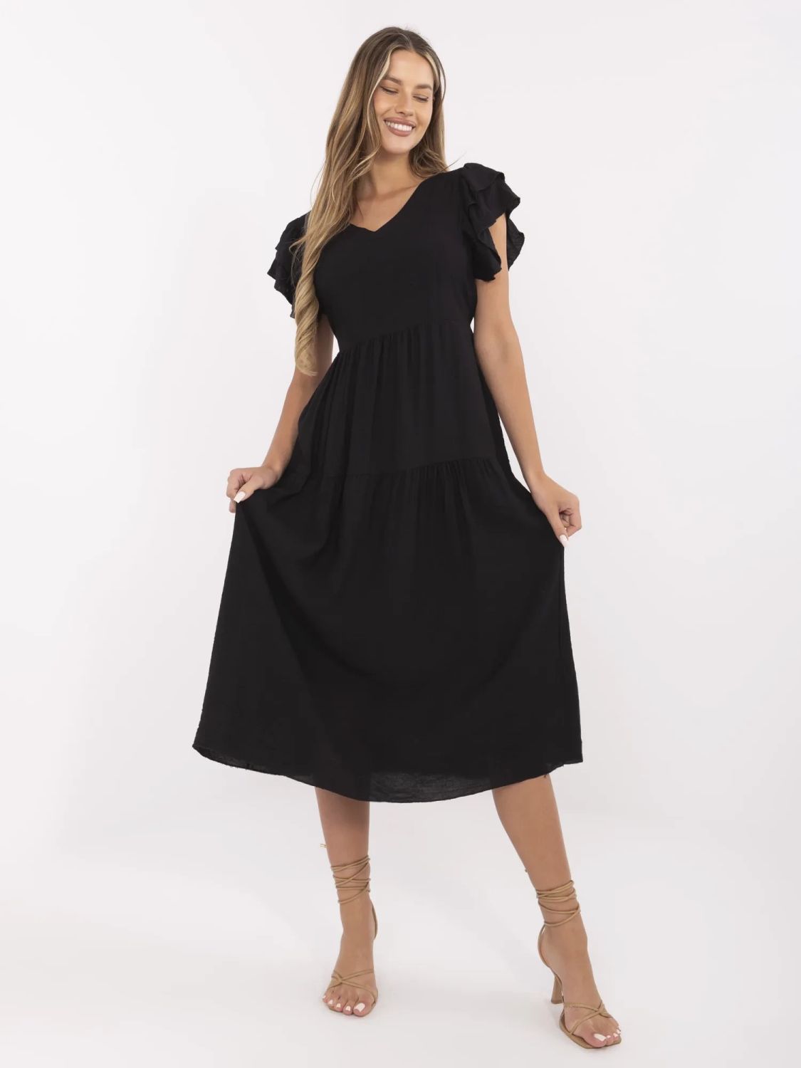 Elegantna črna razširjena obleka