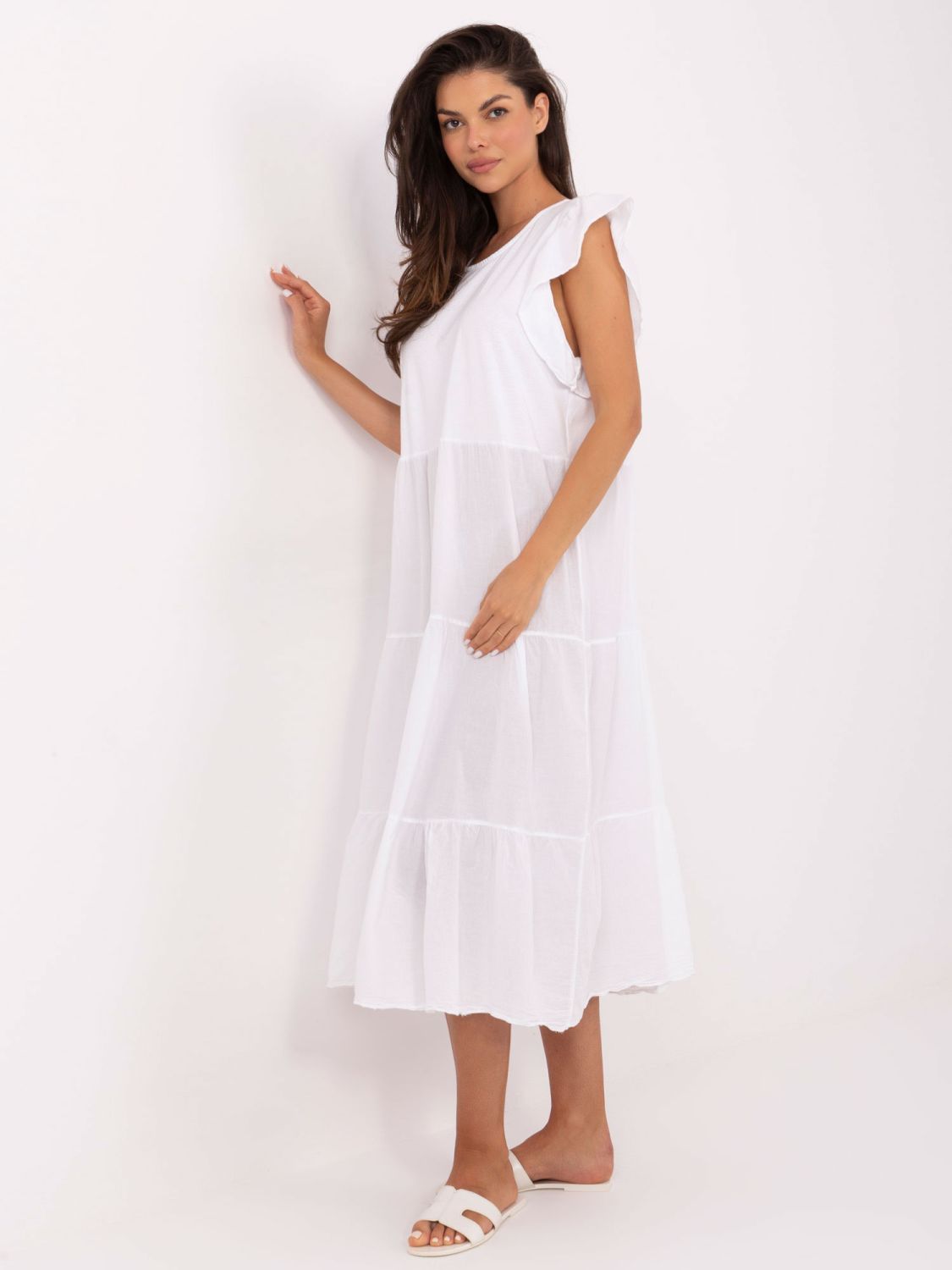 Bela oversize obleka z volanom
