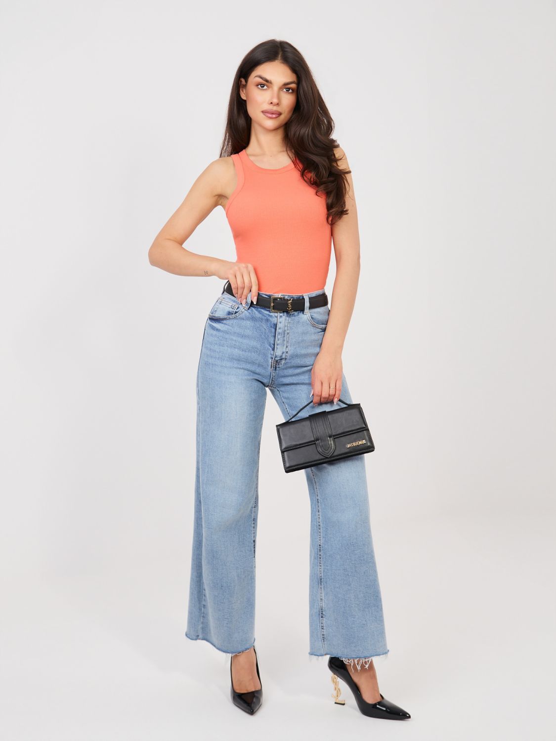 Rebrast oranžen top brez rokavov