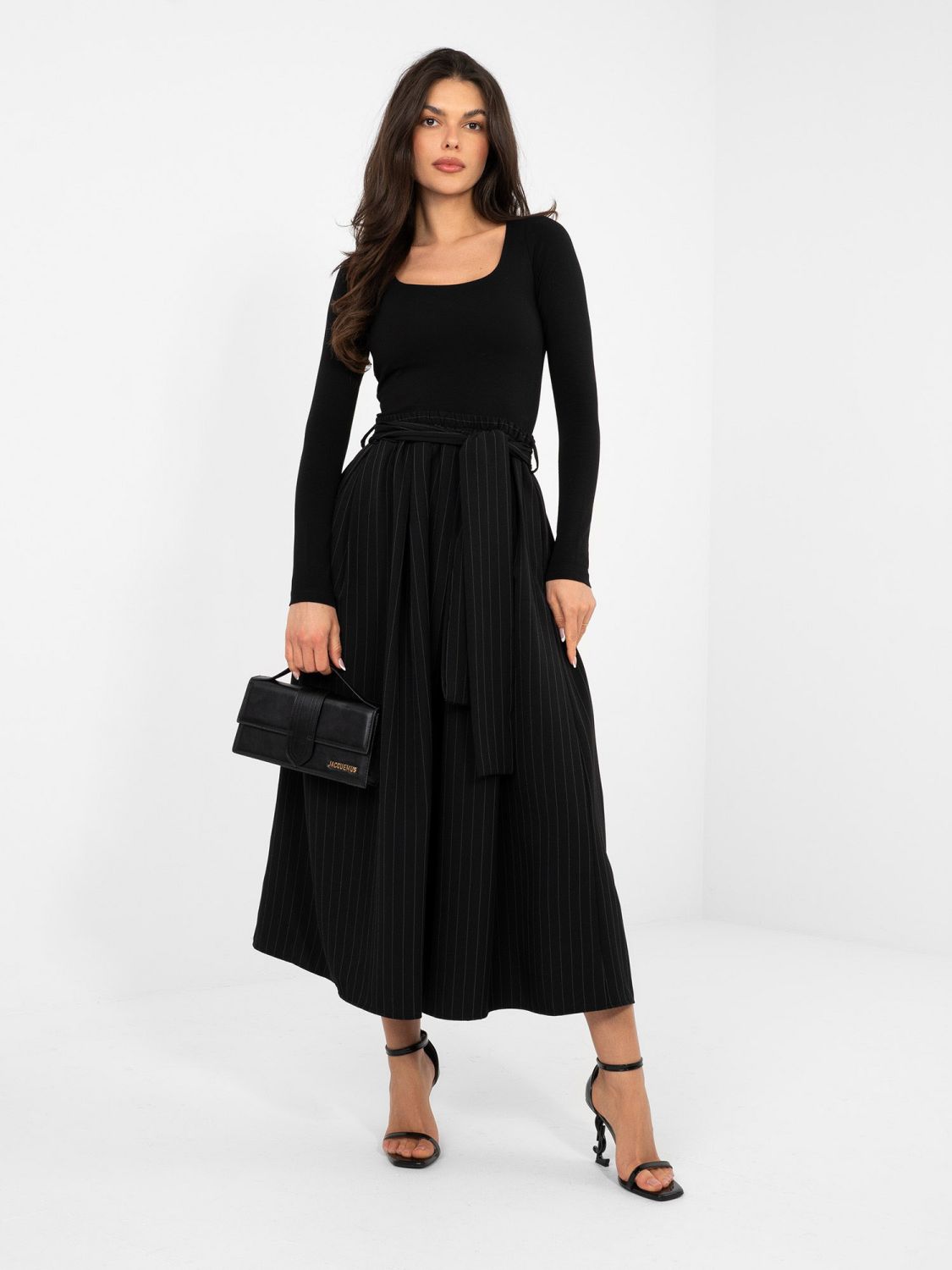 Elegantno črno midi krilo s pasom in žepi