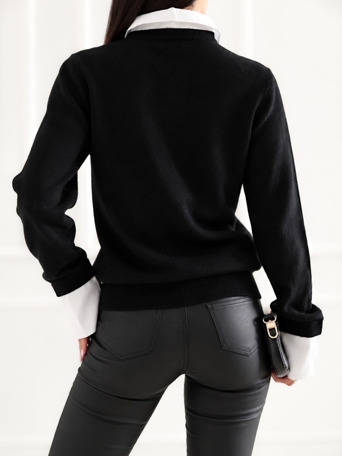 Eleganten črn polo pulover