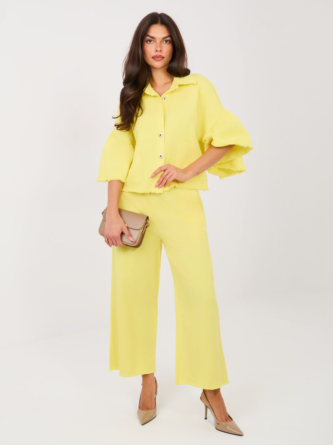 Kratka rumena jeans jakna z volanom in 3/4 rokavi