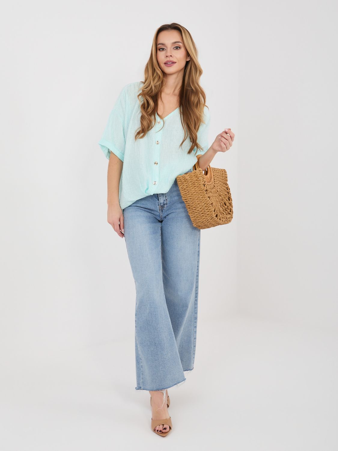 Mint zelena bluza z V-izrezom in kratkimi rokavi