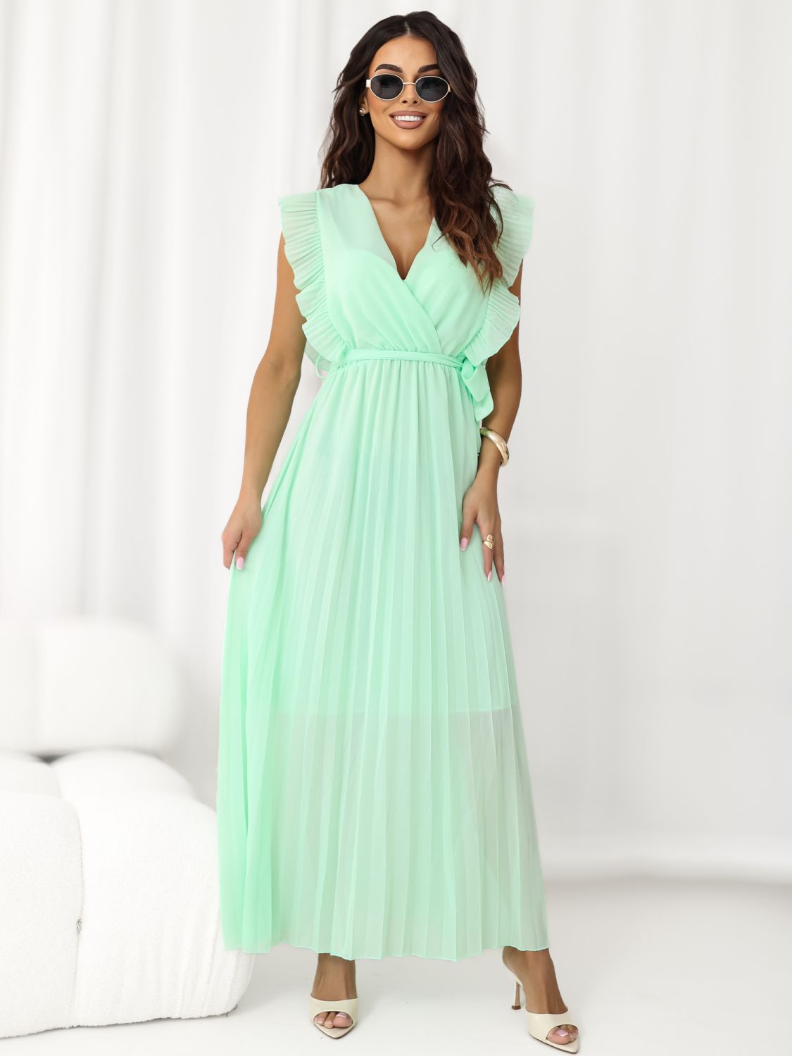 Razširjena midi obleka v mentol zeleni barvi