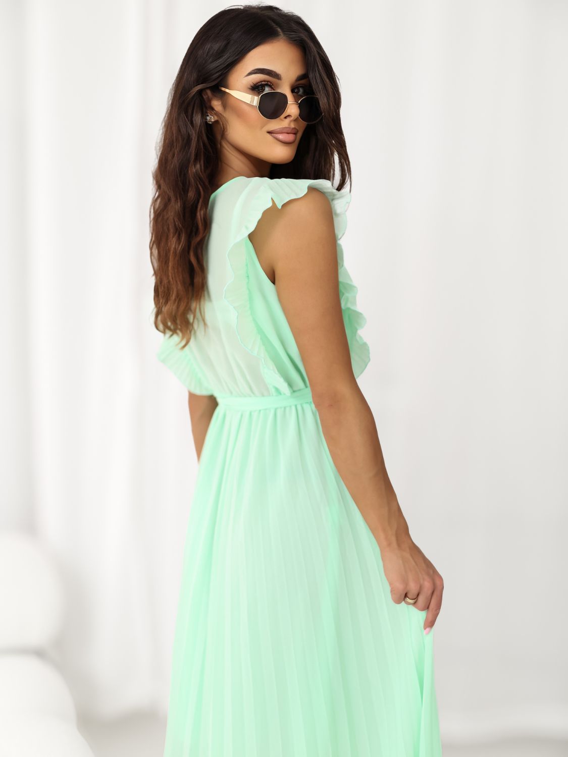 Razširjena midi obleka v mentol zeleni barvi