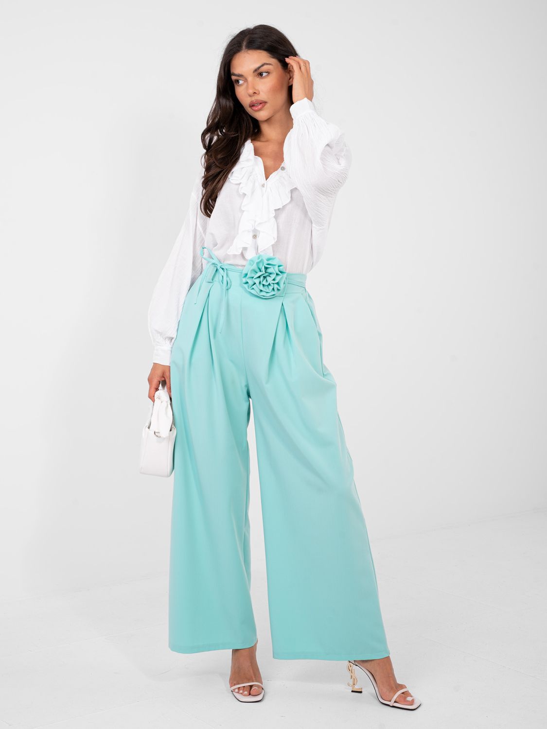 Elegantne široke hlače v mentol zeleni barvi