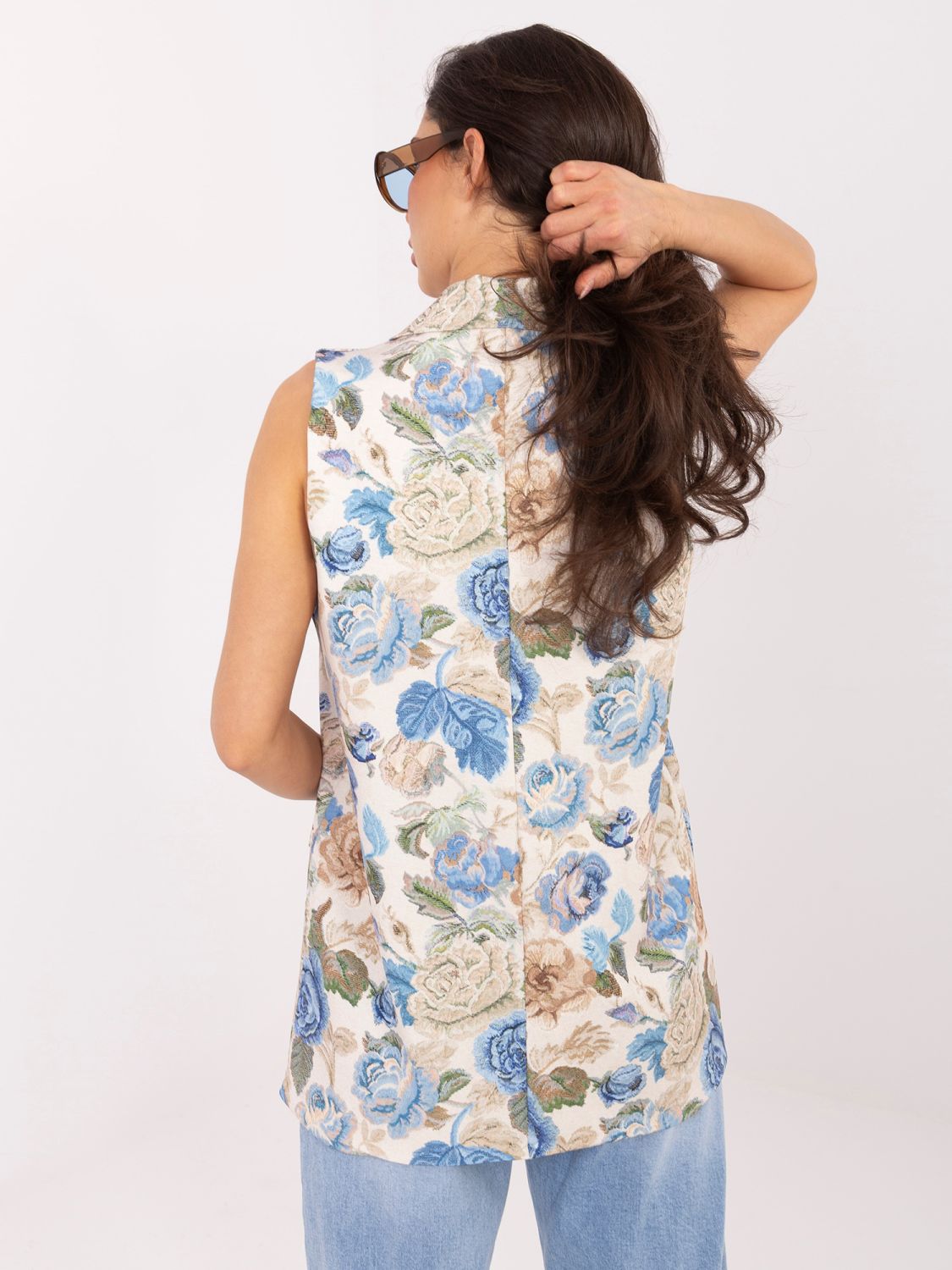 Elegantni modri telovnik s cvetličnim vzorcem