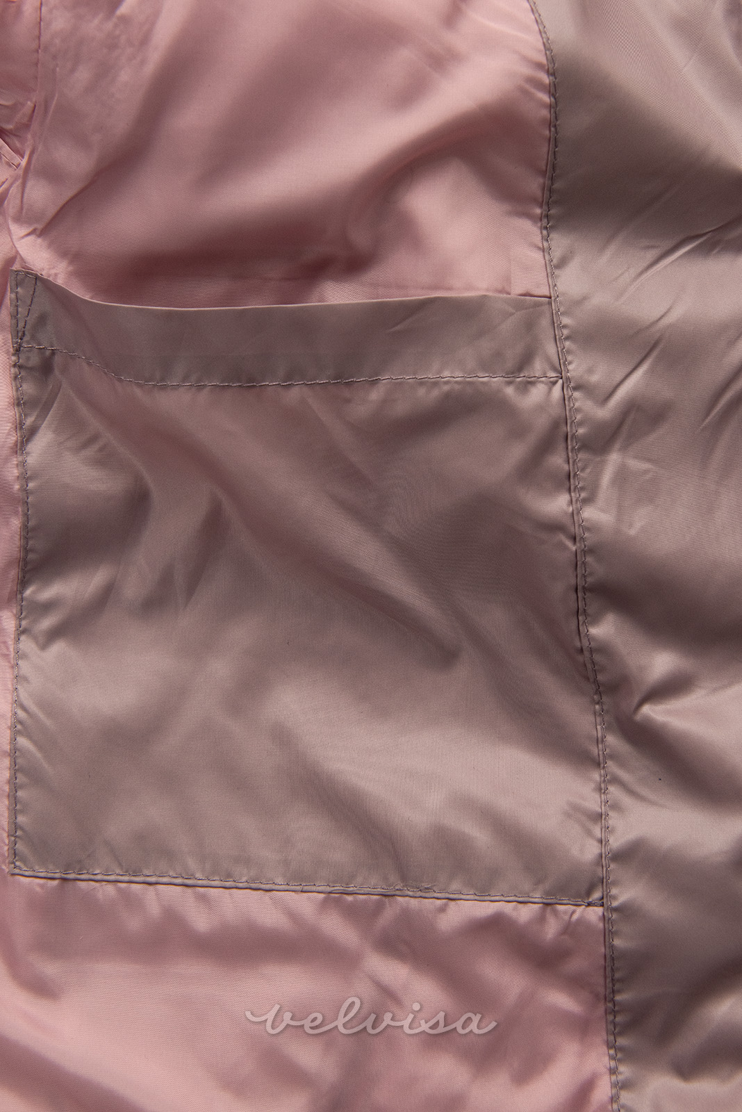 Bledo rožnata dolga prehodna jakna