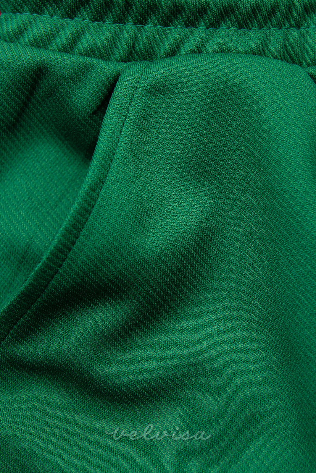 Zelene športne hlače z žepi