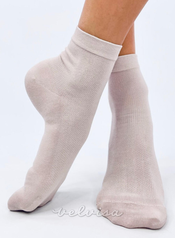 Svetlo rožnate gladke nogavice brez vzorca