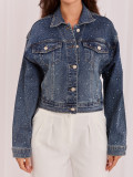 Temno modra jeans jakna z aplikacijo