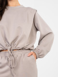 Ženski bež komplet z vezanjem in dolgimi rokavi