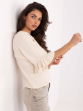 Eleganten bež pulover s 3/4 rokavi in volanom