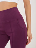 Temno vijolične športne hlače z ravnim krojem