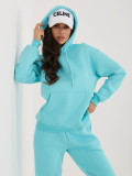 Turkizni ženski komplet s kapuco in dolgimi rokavi